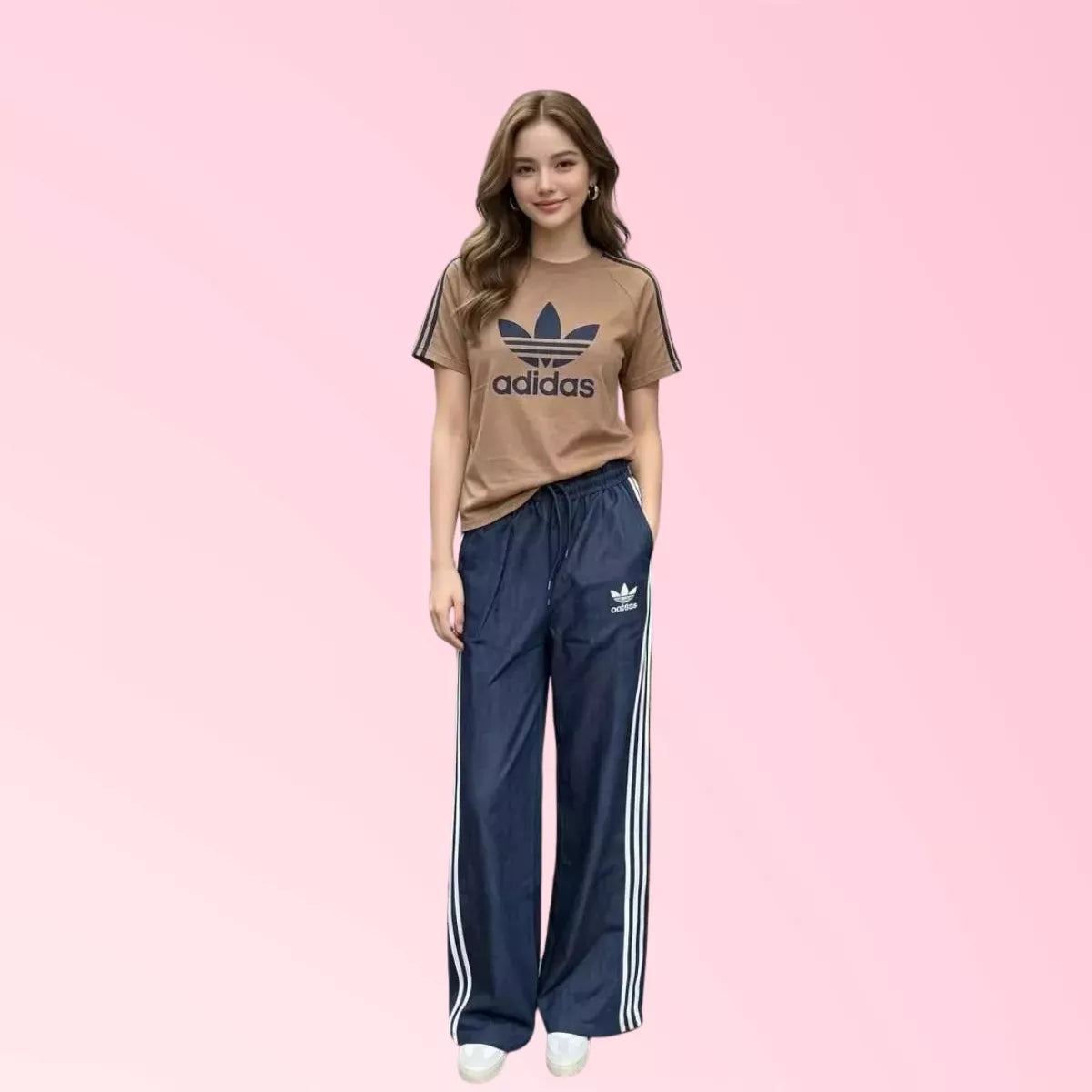 Women’s brown graphic T-shirt with blue wide-leg striped pants