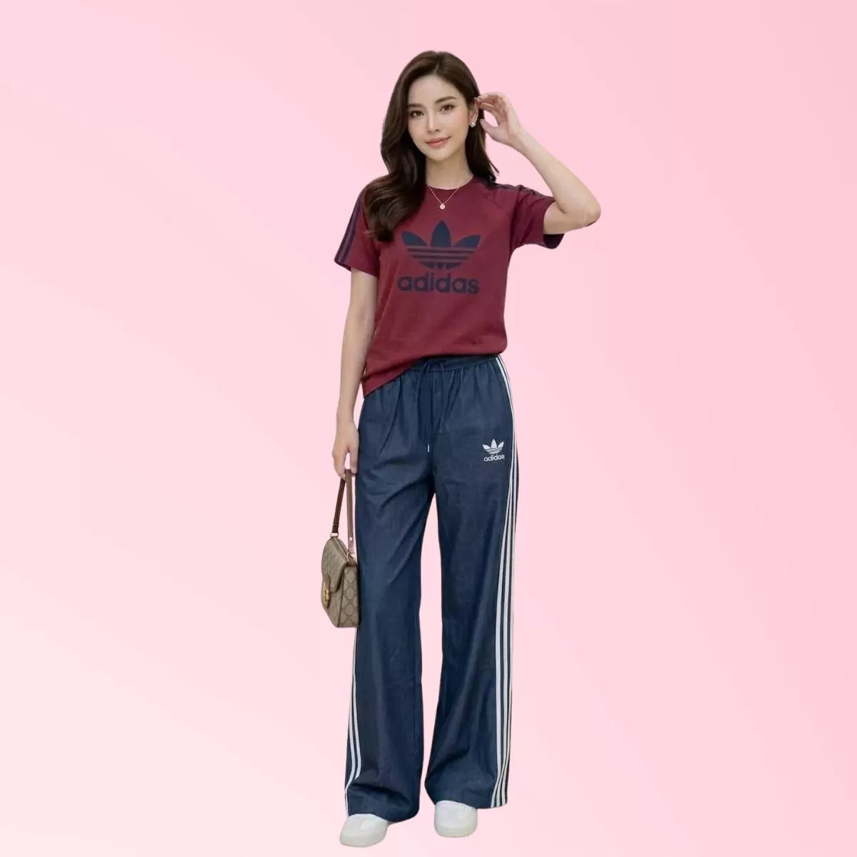 Women’s burgundy graphic T-shirt with blue wide-leg striped pants
