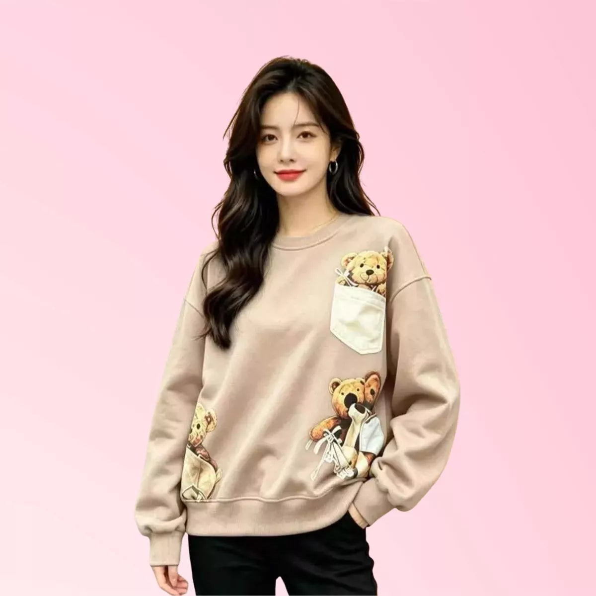 Women’s beige teddy bear graphic sweatshirt with pocket detail
