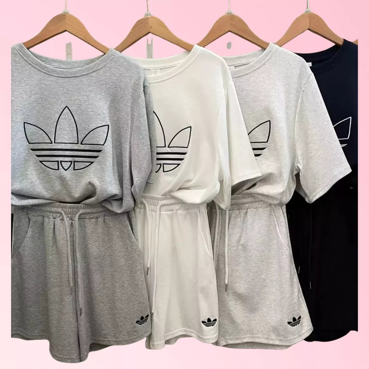 Women’s T-shirt and shorts set shown in multiple colours in hangers
