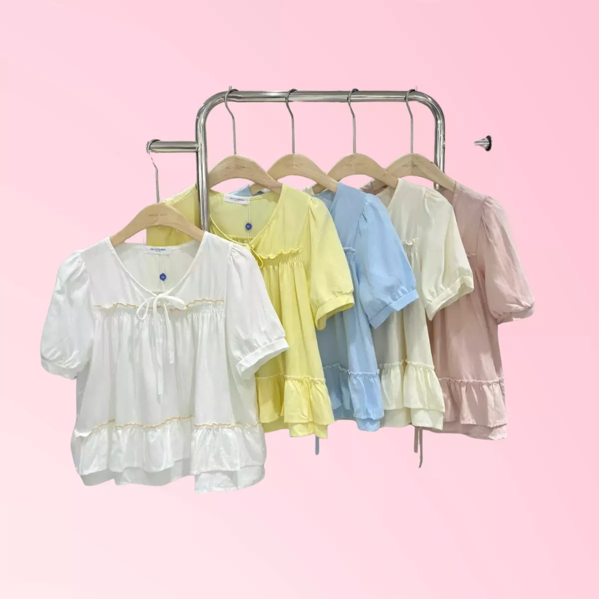 Ruffle peplum short-sleeve blouse shown in multiple colour options
