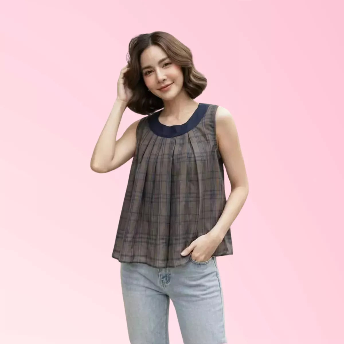 Women’s charcoal plaid sleeveless top with navy contrast collar
