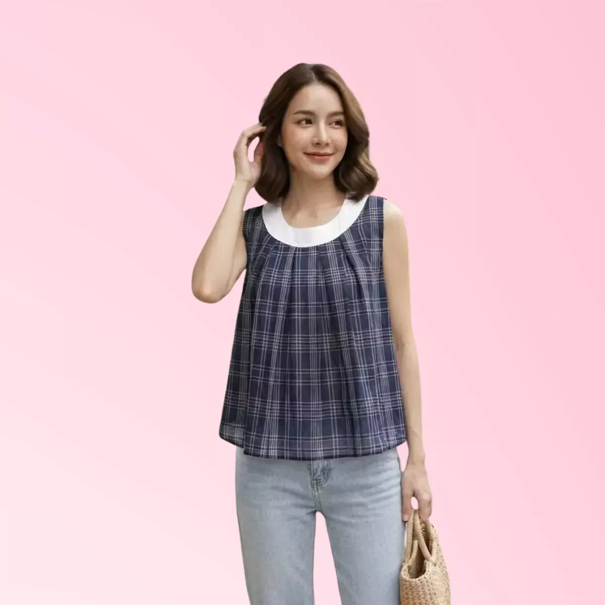 Women’s ivory plaid sleeveless top with navy contrast collar